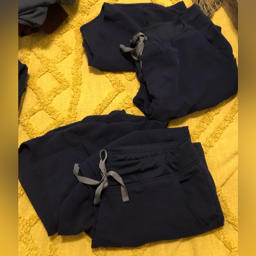 Figs Navy Scrubs Sets: 2 of XL (P) Zamora Jogger, and 2 of XL Catarina tops.